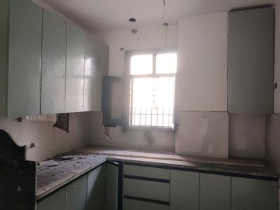 Kitchen Image of 890 Sq.ft 3 BHK Apartment / Flat for sale in Fairdeal Burari Dream Homes, Burari New Delhi for Rs. 4200000