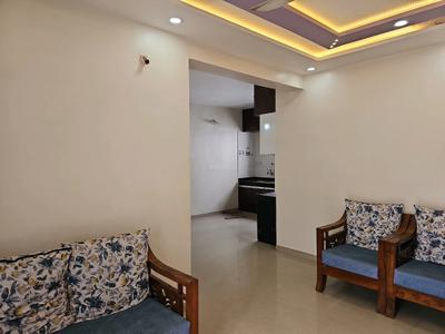 Living Room Image of 960 Sq.ft 2 BHK Apartment / Flat for sale in Windsor Maple Woodz, Wagholi Pune for Rs. 5300000