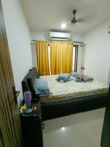 Bedroom Image of 650 Sq.ft 1.5 BHK Apartment / Flat for rent in Universal Mashayakh Tower, Malad West Mumbai for Rs. 57000