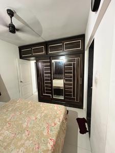 Bedroom Image of 672 Sq.ft 2 BHK Apartment / Flat for rent in Ashtavinayak City, Fursungi Pune for Rs. 24000