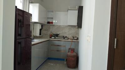 Kitchen Image of 1200 Sq.ft 2 BHK Builder Floor for rent in Signature Global City 92, Sector 92 Gurgaon for Rs. 33000