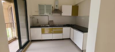Kitchen Image of 760 Sq.ft 1.5 BHK Apartment / Flat for rent in Long Island, Charholi Budruk Pune for Rs. 20000