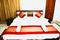 Bedroom Image of Madhuraj Hotels in Sector 51, Noida
