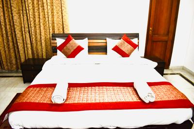 Bedroom Image of Madhuraj Hotels in Sector 51, Noida