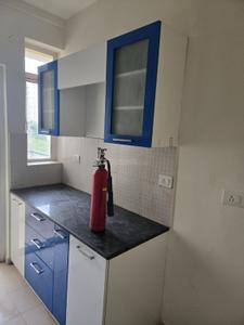 Kitchen Image of 920 Sq.ft 2 BHK Apartment / Flat for rent in DLF Woodland Heights, Bommasandra Bengaluru for Rs. 25000
