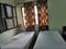 Bedroom Image of Nisha PG in Janakpuri, New Delhi