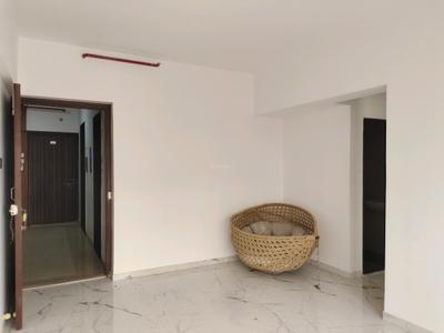 Living Room Image of 525 Sq.ft 1 BHK Apartment / Flat for sale in Dharti Pressidio, Kandivali West Mumbai for Rs. 9500000