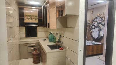 Kitchen Image of 1100 Sq.ft 3 BHK Builder Floor for rent in Dwarka Mor New Delhi for Rs. 18500