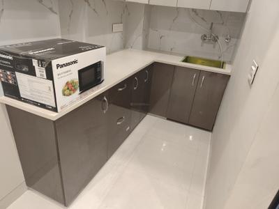 Kitchen Image of 1500 Sq.ft 1 BHK Builder Floor for rent in Sector 38 Gurgaon for Rs. 38000