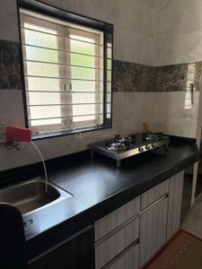 Kitchen Image of 1800 Sq.ft 4 BHK Independent House for sale in Chanakyapuri Ahmedabad for Rs. 27000000