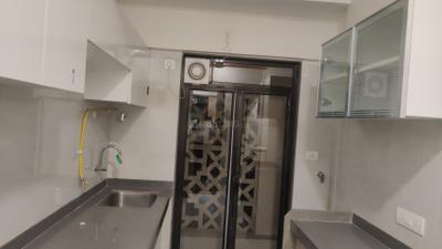 Kitchen Image of 1051 Sq.ft 2 BHK Apartment / Flat for sale in Modirealty Wisteria, Kandivali West Mumbai for Rs. 18100000