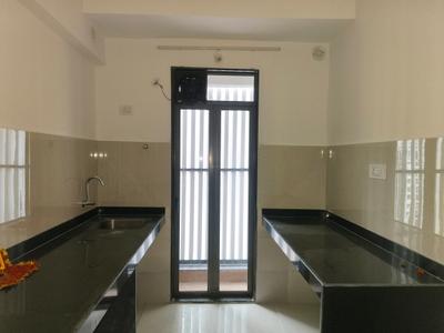 Kitchen Image of 1290 Sq.ft 3 BHK Apartment / Flat for sale in Runwal Gardens, Usarghar Thane for Rs. 9200000
