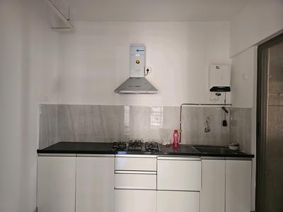 Kitchen Image of 850 Sq.ft 2 BHK Apartment / Flat for sale in Manhattan, Charholi Budruk Pune for Rs. 7400000