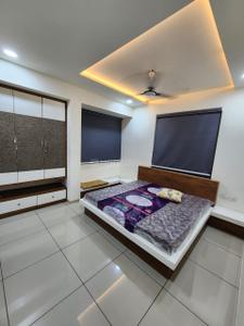 Bedroom Image of 1100 Sq.ft 3 BHK Apartment / Flat for rent in Shambhu Savan Signet, Radhika Park Rajkot for Rs. 34000