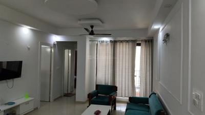 Living Room Image of 1040 Sq.ft 2 BHK Apartment / Flat for rent in Logix Blossom County, Sector 137 Noida for Rs. 39000