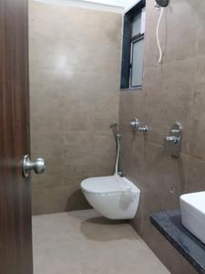 Common Bathroom Image of 550 Sq.ft 1 BHK Apartment / Flat for sale in Chheda Avighna, Mira Road East Mira Bhayandar for Rs. 8000000