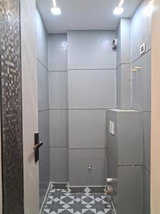 Common Bathroom Image of 600 Sq.ft 2 BHK Builder Floor for sale in Happy Home, Uttam Nagar New Delhi for Rs. 4000000