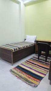 Bedroom Image of Shyam Vandana Boys PG Accommodation in Sector 22, Noida