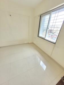 Bedroom Image of 690 Sq.ft 1 BHK Apartment / Flat for rent in Surya Nagari society, Pimple Gurav Pune for Rs. 15000