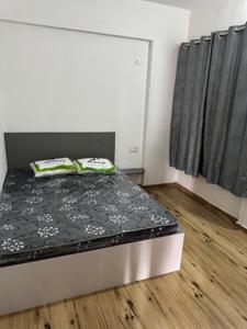 Bedroom Image of 750 Sq.ft 2 BHK Apartment / Flat for rent in Sainath Kundan Altura, Chikhali Pune for Rs. 28000