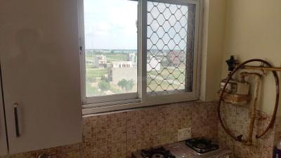 Kitchen Image of 680 Sq.ft 1 BHK Apartment / Flat for rent in UCHDPL Swamanorath, Wave City Ghaziabad for Rs. 18500