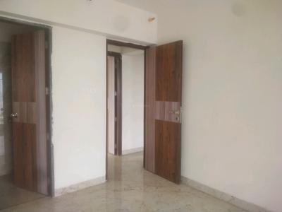 Bedroom Image of 910 Sq.ft 3 BHK Apartment / Flat for sale in Tharwani Vedant Millenia, Titwala Thane for Rs. 6100000