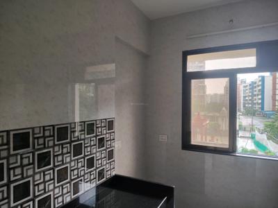 Kitchen Image of 700 Sq.ft 1 BHK Apartment / Flat for rent in Puraniks City Reserva Phase 1, Kasarvadavali Thane for Rs. 16000