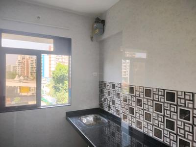 Kitchen Image of 550 Sq.ft 1 BHK Apartment / Flat for rent in Puraniks Kanchan Pushp Society, Kasarvadavali Thane for Rs. 26000