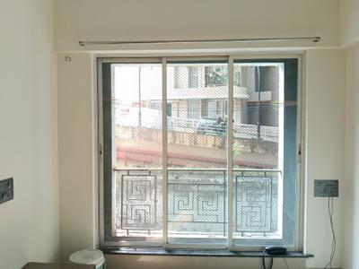 Living Room Image of 575 Sq.ft 1 BHK Apartment / Flat for rent in Unnati Woods Phase 7, Kasarvadavali Thane for Rs. 18000