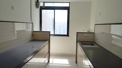 Kitchen Image of 900 Sq.ft 2 BHK Apartment / Flat for rent in Dynamix Divum, Malad East Mumbai for Rs. 68000