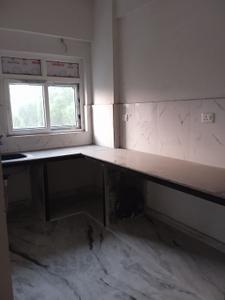 Kitchen Image of 1075 Sq.ft 2 BHK Apartment / Flat for sale in Ambient Winds, Kalikapur, EM Bypass Kolkata for Rs. 9500000