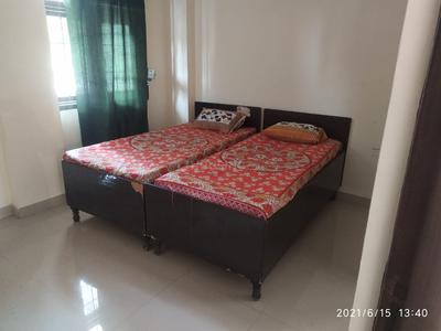 Bedroom Image of Living point pg in Sector 61, Noida