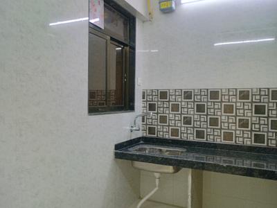 Kitchen Image of 945 Sq.ft 2 BHK Apartment / Flat for sale in Rkr Precious Empire Wing D E And F, Ambernath East Ambernath for Rs. 4100000