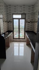 Kitchen Image of 1050 Sq.ft 2 BHK Apartment / Flat for rent in National Trinity Paradise Phase 1, Shilphata Thane for Rs. 17500