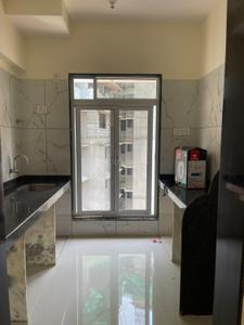 Kitchen Image of 725 Sq.ft 1 BHK Apartment / Flat for sale in Kalyan East Kalyan for Rs. 4100000