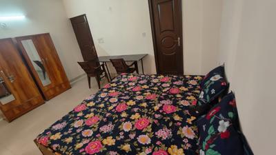 Bedroom Image of BIHARI JI PG in Sector 17A, Greater Noida