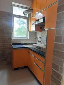Kitchen Image of 560 Sq.ft 1 BHK Apartment / Flat for sale in Sector 15 Part 2 Gurgaon for Rs. 7000000