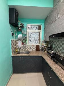 Kitchen Image of 850 Sq.ft 2 BHK Apartment / Flat for sale in Mahagun Mantra II, Noida Extension Greater Noida for Rs. 7500000