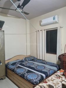 Bedroom Image of 940 Sq.ft 2 BHK Apartment / Flat for sale in Swaraj Homes Nilkanth Apartment, Pimple Gurav Pune for Rs. 6050000