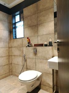 Common Bathroom Image of 1030 Sq.ft 2 BHK Apartment / Flat for sale in KP Supernova, Mohammed Wadi Pune for Rs. 7500000