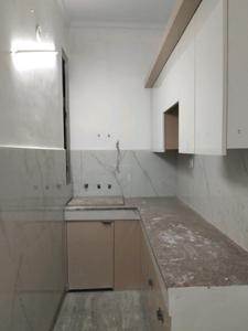 Kitchen Image of 865 Sq.ft 2 BHK Apartment / Flat for sale in Shalimar Garden Ghaziabad for Rs. 3800000