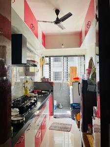 Kitchen Image of 1200 Sq.ft 2 BHK Apartment / Flat for rent in Devjit Pramukh Green Plus Bldg H, Chala Vapi for Rs. 24000