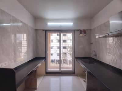 Kitchen Image of 850 Sq.ft 1 BHK Apartment / Flat for sale in Arihant Aarohi, Shilgaon Thane for Rs. 4400000