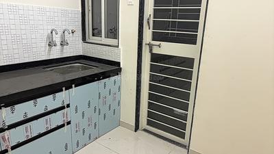 Kitchen Image of 1050 Sq.ft 2 BHK Apartment / Flat for sale in Basil Mondale, Mundhwa Pune for Rs. 8500000