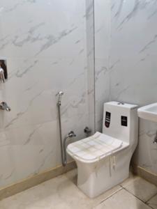 Bedroom Two Image of 874 Sq.ft 3 BHK Apartment / Flat for sale in Dwarka Mor New Delhi for Rs. 5600000