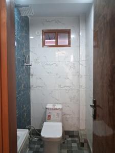 Common Bathroom Image of 1050 Sq.ft 2 BHK Builder Floor for rent in Dwarka Mor New Delhi for Rs. 22000