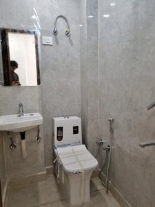 Common Bathroom Image of 600 Sq.ft 2 BHK Apartment / Flat for sale in Hans Builders Floor, Dwarka Mor New Delhi for Rs. 3900000