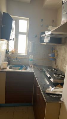 Kitchen Image of 396 Sq.ft 1 BHK Studio for sale in Paras Tierea, Sector 137 Noida for Rs. 4900000