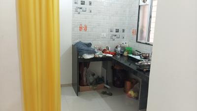 Kitchen Image of 650 Sq.ft 2 BHK Apartment / Flat for rent in Charholi Budruk Pune for Rs. 16000