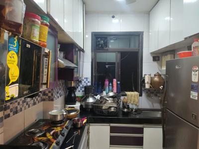 Kitchen Image of 750 Sq.ft 2 BHK Apartment / Flat for rent in Puraniks City Reserva Phase 1, Kasarvadavali Thane for Rs. 19000